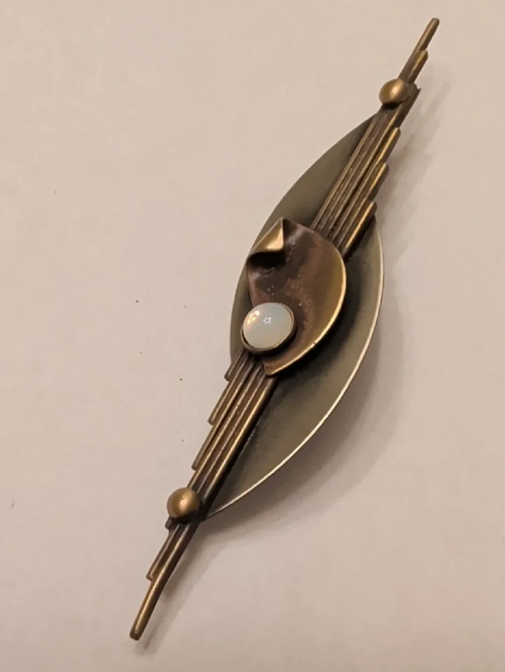 Vintage-Inspired Bronze Bar Brooch with Opalescent Cabochon